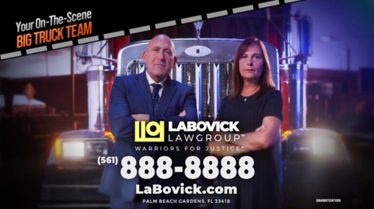 Brian and Esther LaBovick in front of a big truck