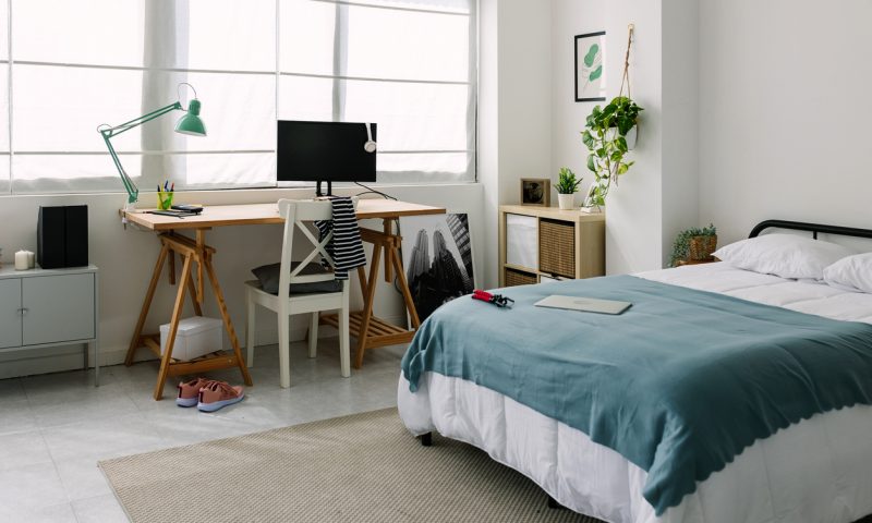 Teenager bedchamber. Bright cozy adolescent bedroom with bed and desk workplace