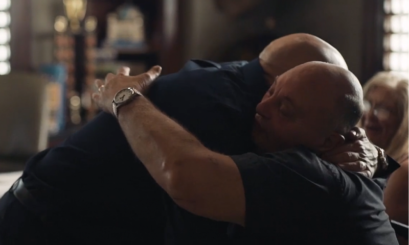 Brian hugging a man